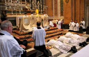June 22,2013: The prostration of the ordinands during the Litany of the Saints at the Fraternity of St. Peter's Roman parish, Santissima Trinità dei Pellegrini in Rome CNA
